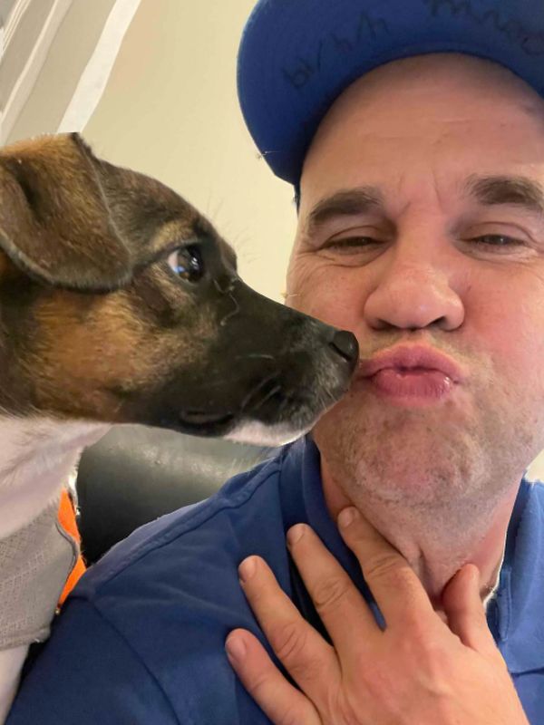 Owner with his dog, A Friendly Carpet Cleaning